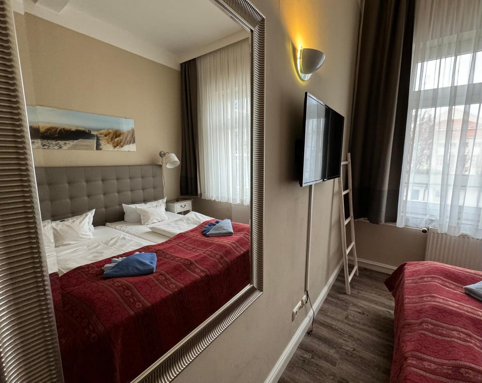 Hotel Villa Schwanebeck Остзебад Бинц Номер фото